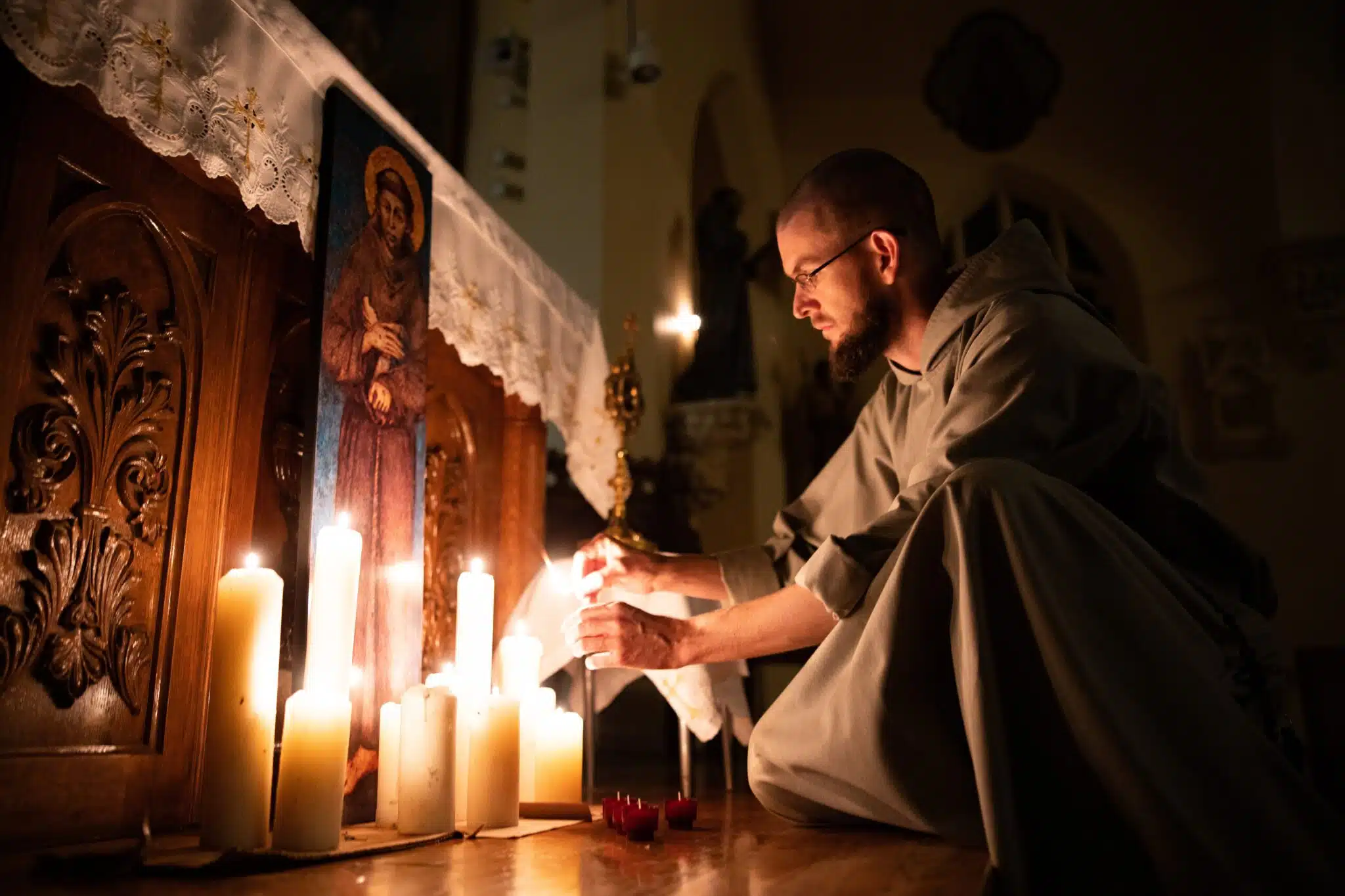 Father Gabriel Emmanuel prepares the sanctuary for the "transitus"