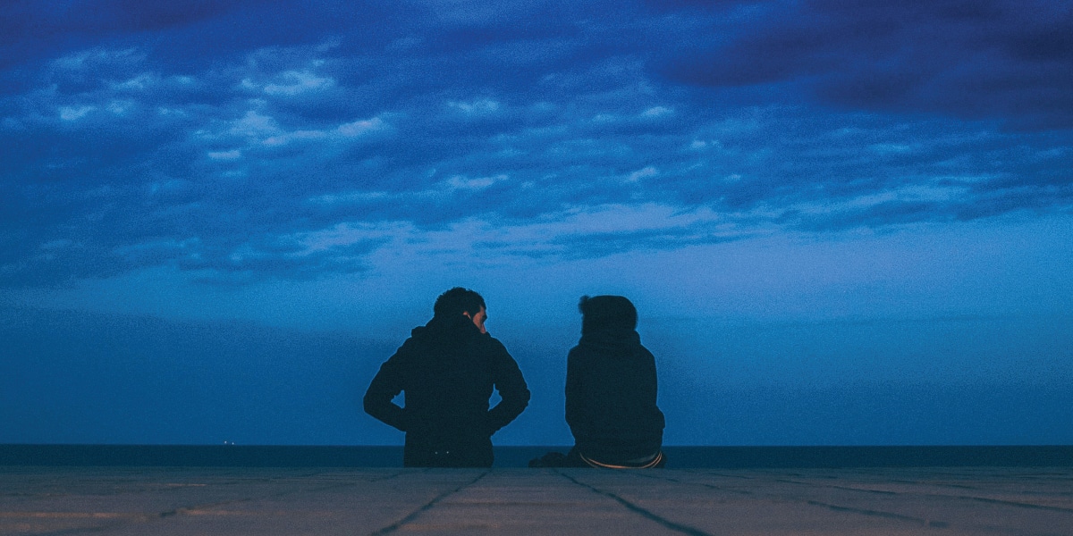 Two people talking